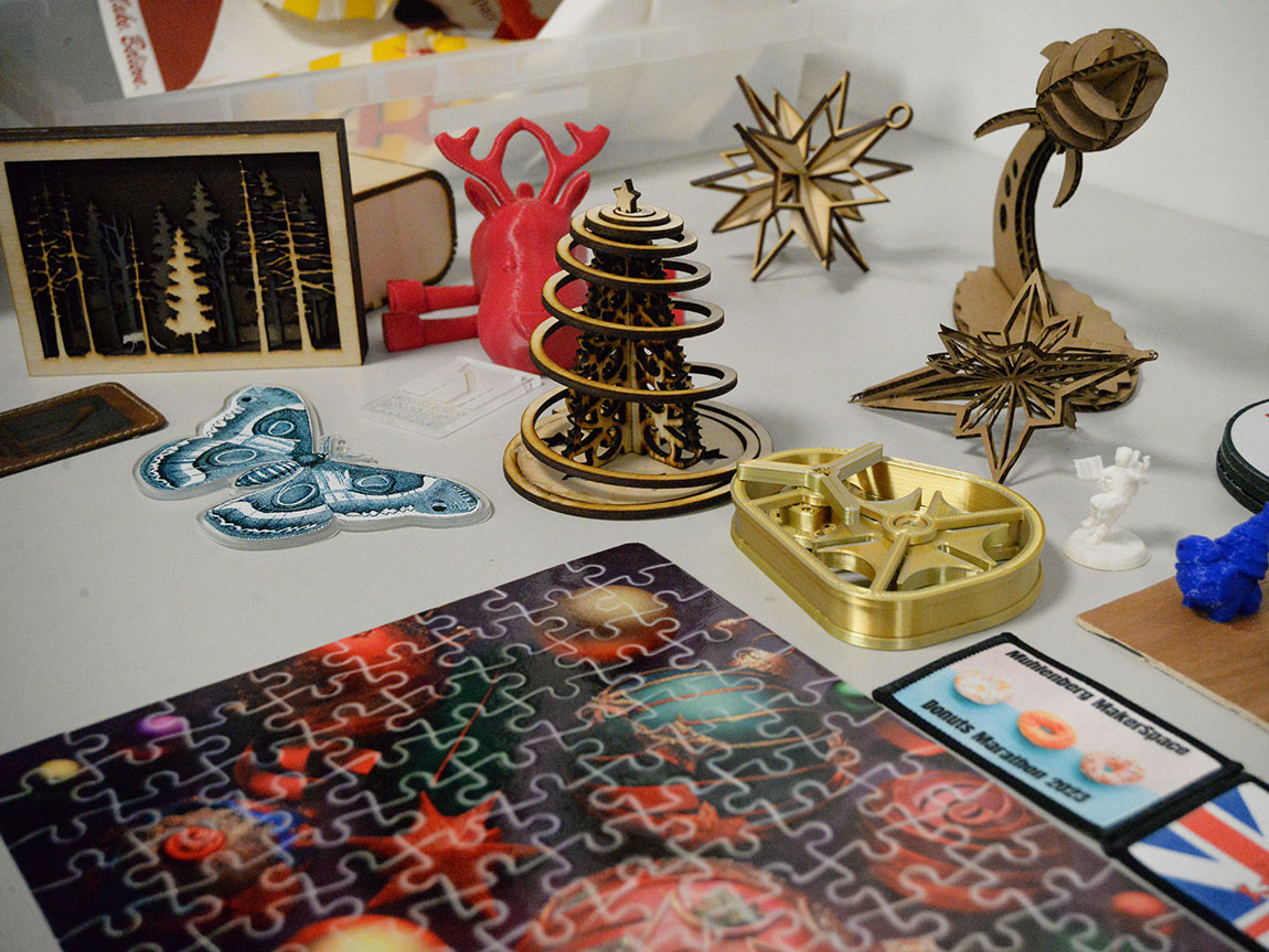 A selection of 3D printed, laser cut, and other holiday items made in the Makerspace
